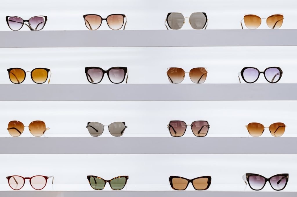 black-framed-sunglasses-on-white-surface-zt99ho5hq3s