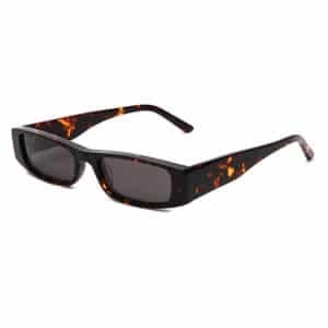A three-quarter angled view of rectangular narrow sunglasses featuring a glossy tortoiseshell frame and dark grey lenses against a white background.