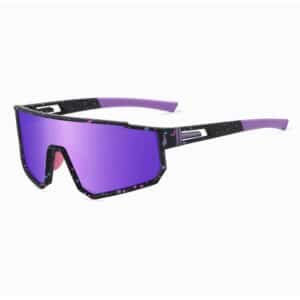 Angled side view of ladies sports sunglasses featuring a black speckled frame, wide purple lenses, and purple anti-slip temple grips.