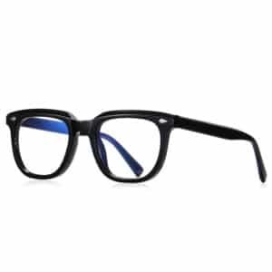 A three-quarter angle view of black TR90 Eyeglasses featuring classic square frames and lenses with a blue-light-blocking reflection.